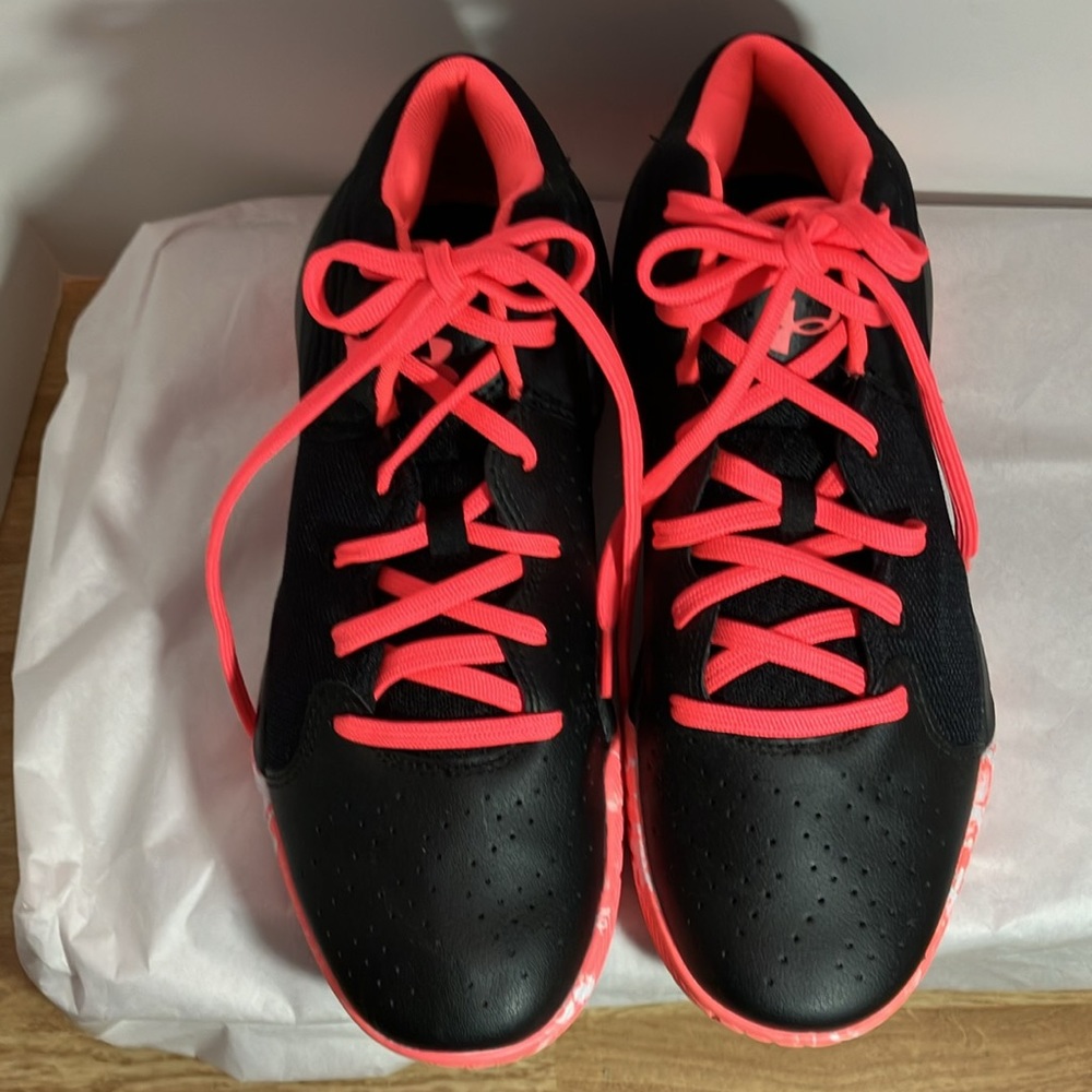 Under Armour mid top basketball sneakers. Size 7Y. NWOB